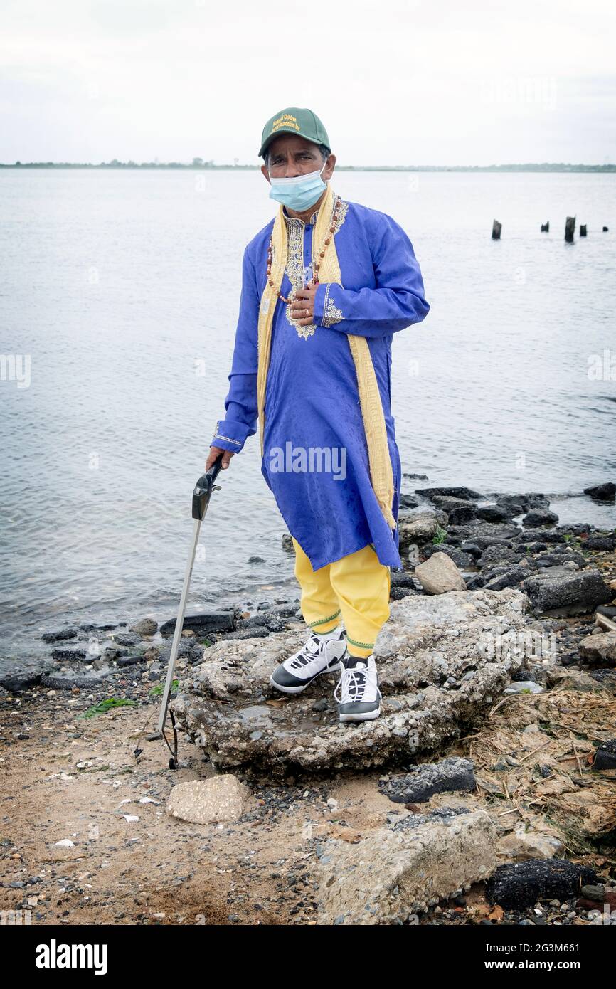 A Hindu priest volunteer who helped clean the beach at Jamaica Bay in