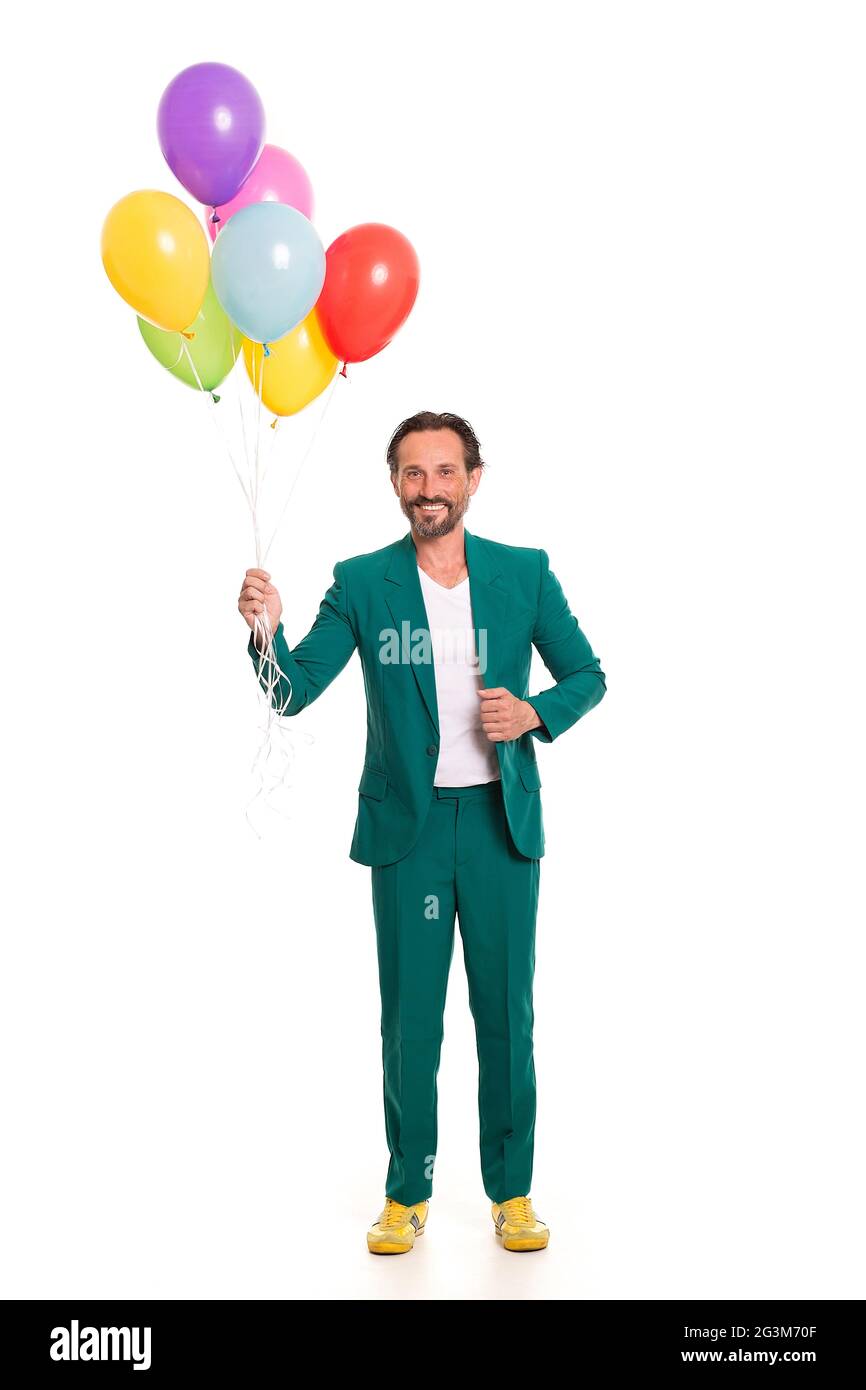 Handsome man in green suit Stock Photo Alamy