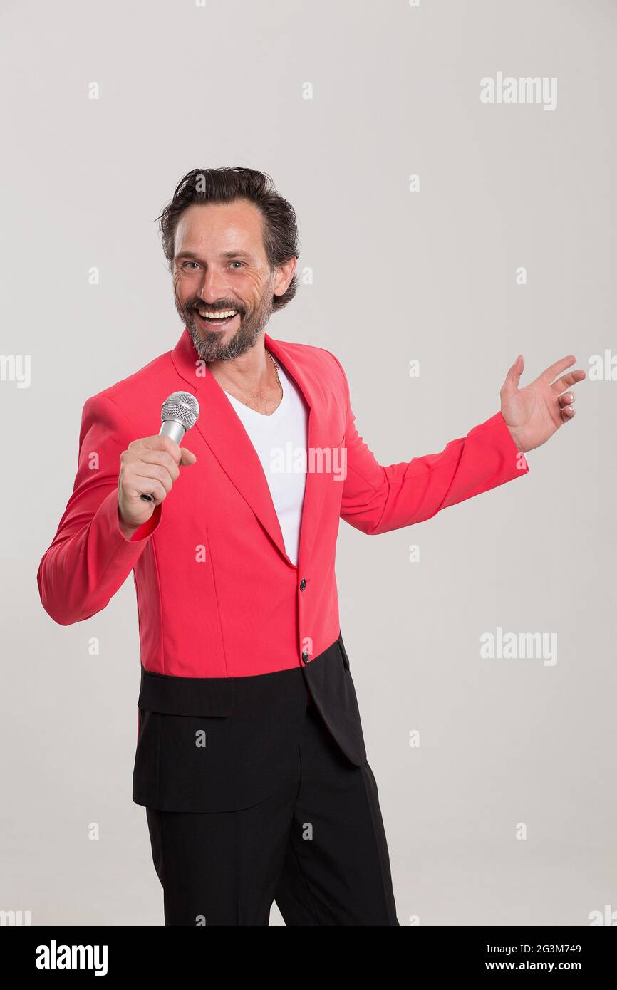 Black and red suit hi-res stock photography and images - Alamy