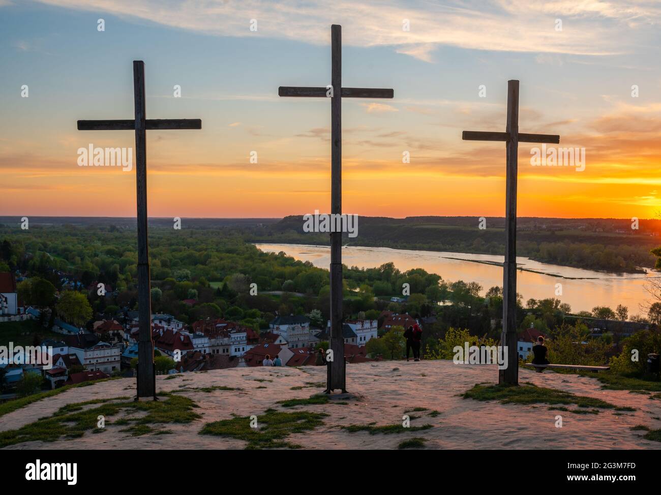 Three wooden crosses on the hill above the city Stock Photo Alamy