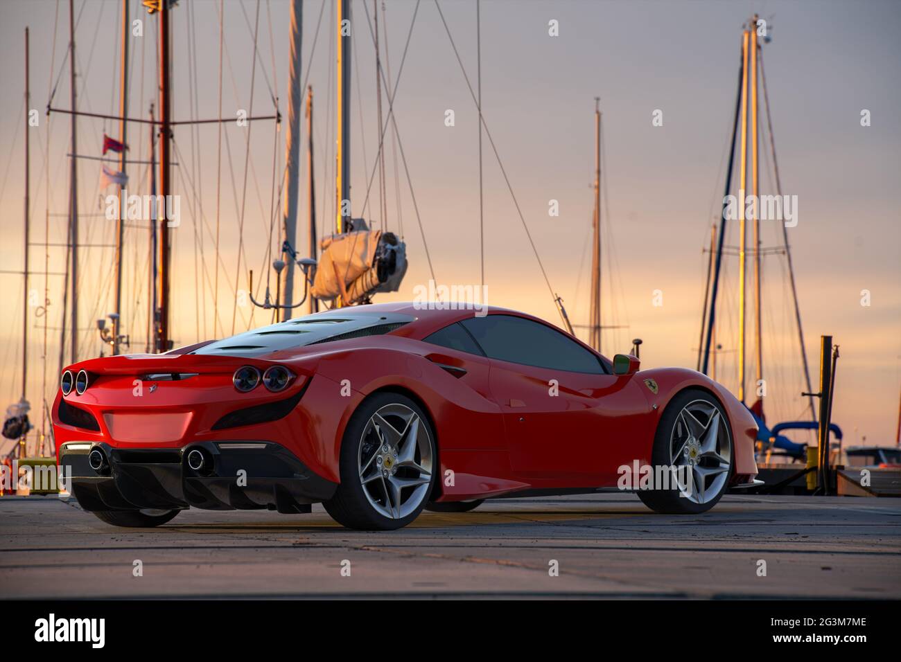 Red Ferrari f8 Tributo in the marina parking lot Stock Photo