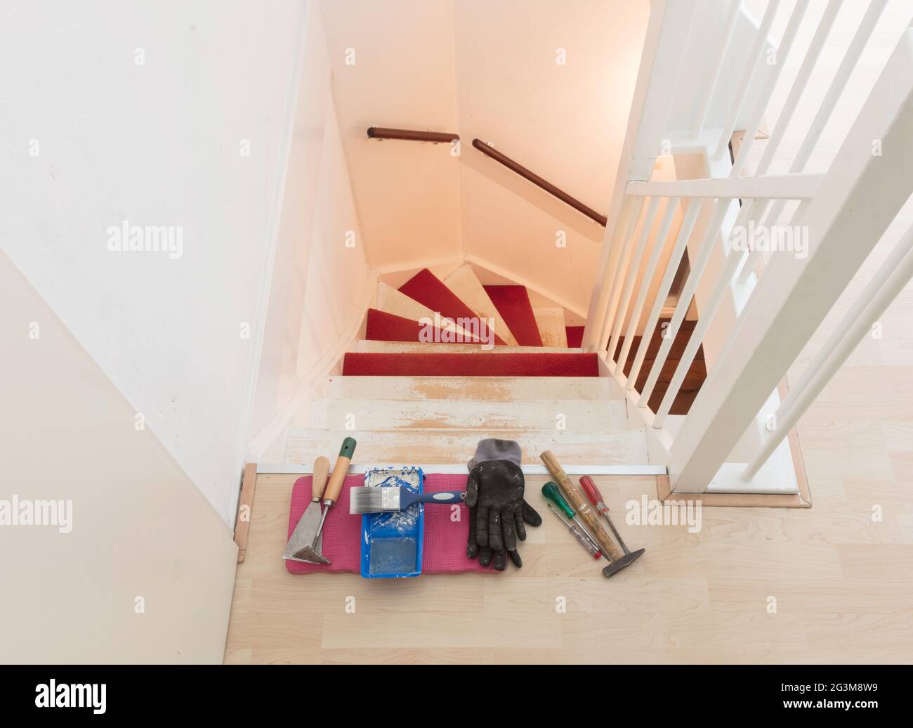 Removing carpet, glue and paint from an vintage stairs Stock Photo Alamy