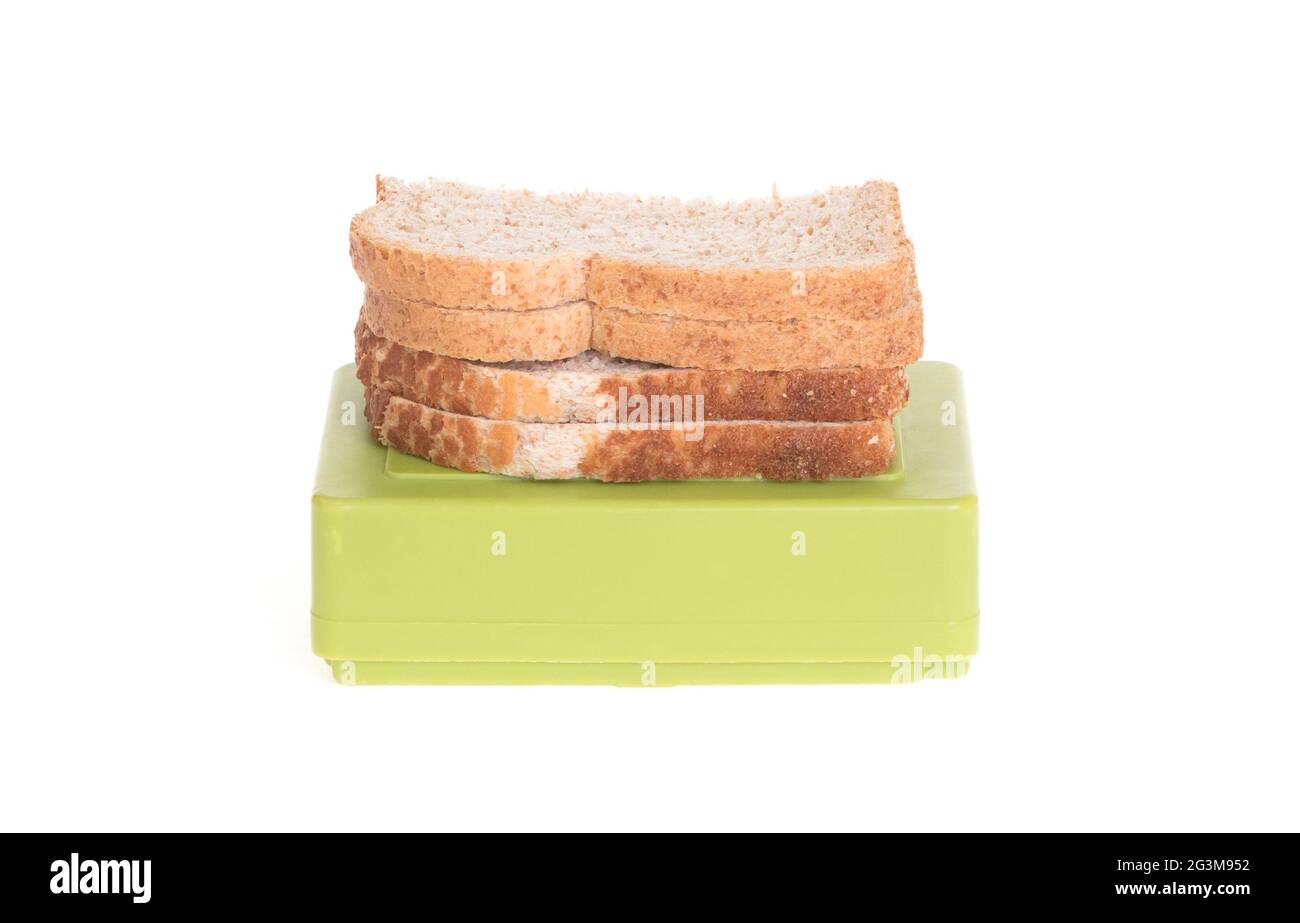 Simple old lunch box isolated Stock Photo - Alamy