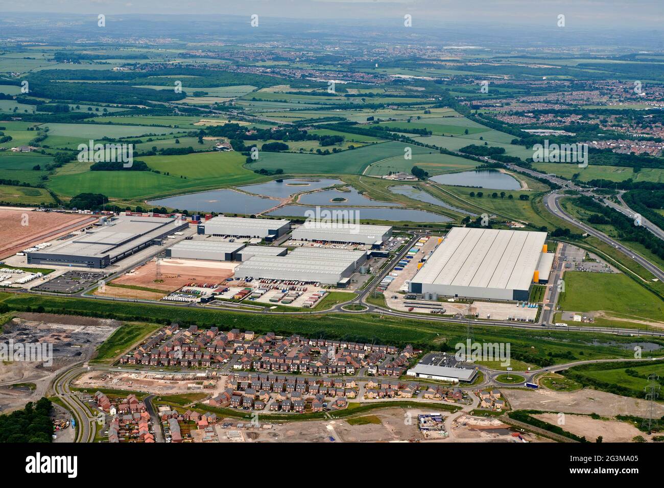 An aerial view of Doncaster iport distribution centre, South Yorkshire, northern England, UK, Amazon shed dominant Stock Photo