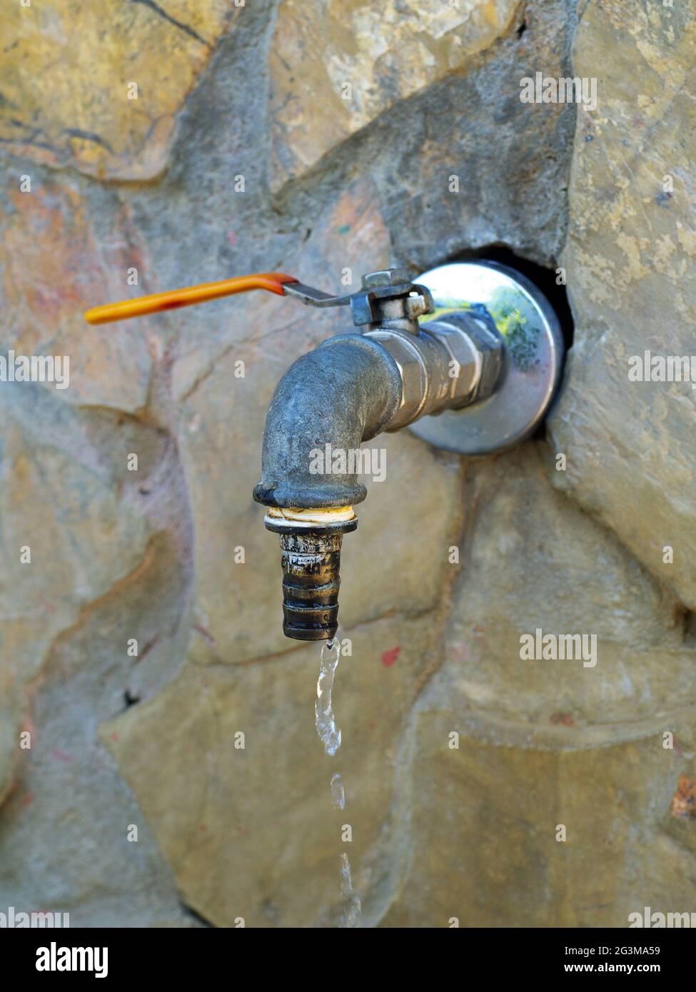 water dripping from outdoor spigot Stock Photo Alamy