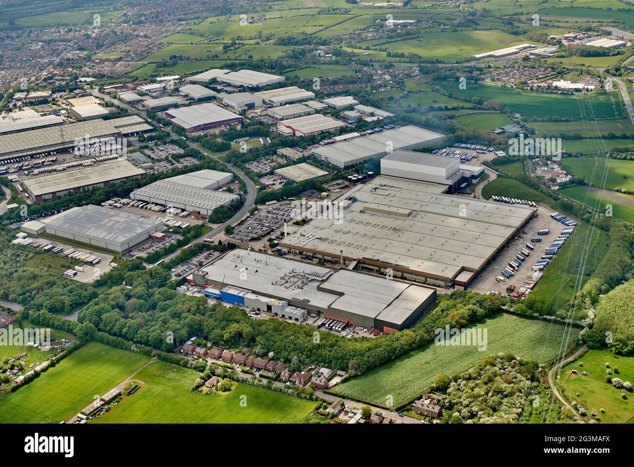 An aerial view of Junction 41 industrial estate, Wakefield, West Yorkshire, Northern England, UK, Coca Cola plant dominant right Stock Photo
