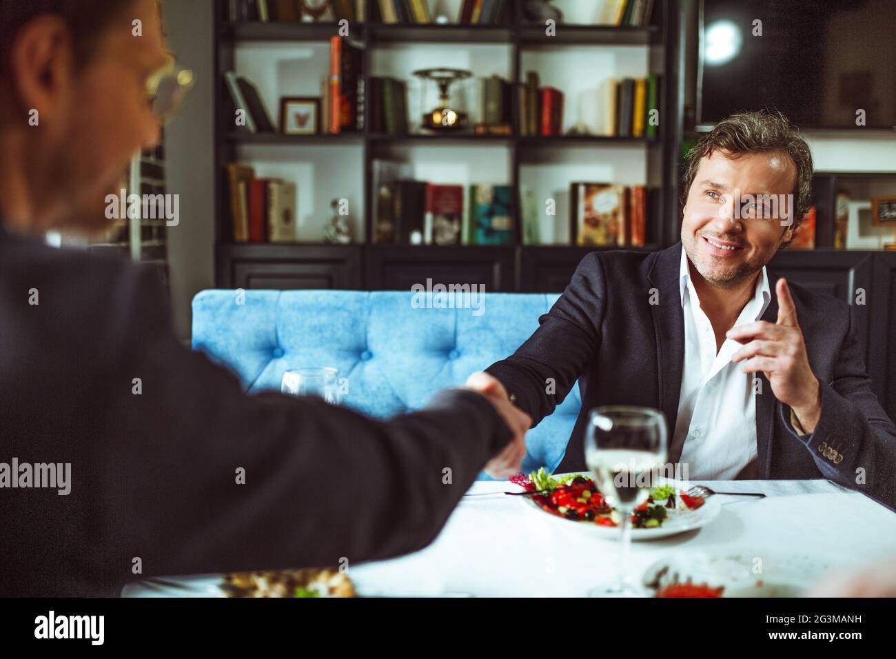 Businesspeople having business lunch Stock Photo