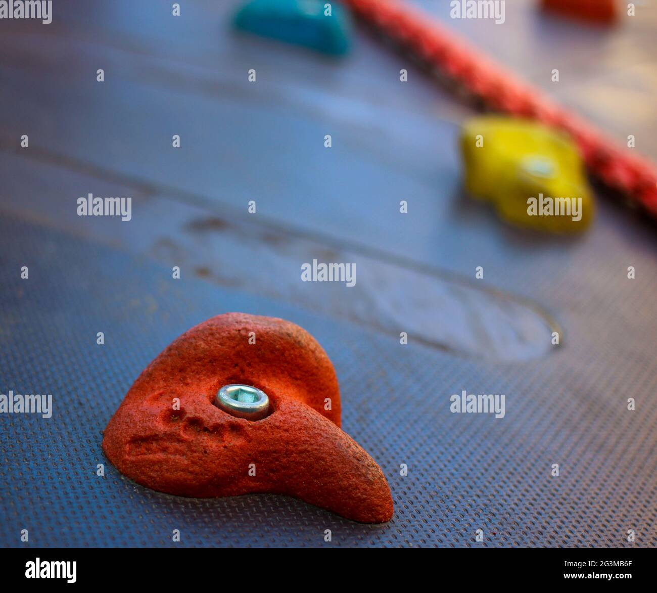 Climbing wall stone close up view. Sport and active lifestyle equipment. Park and outdoor kids activities. High quality photo Stock Photo
