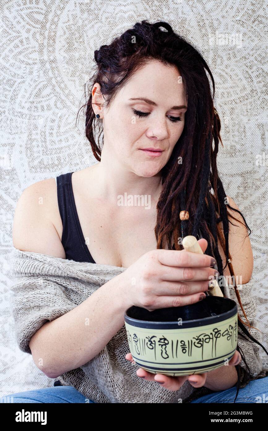 daily meditation practice at home with singing bowl Stock Photo Alamy