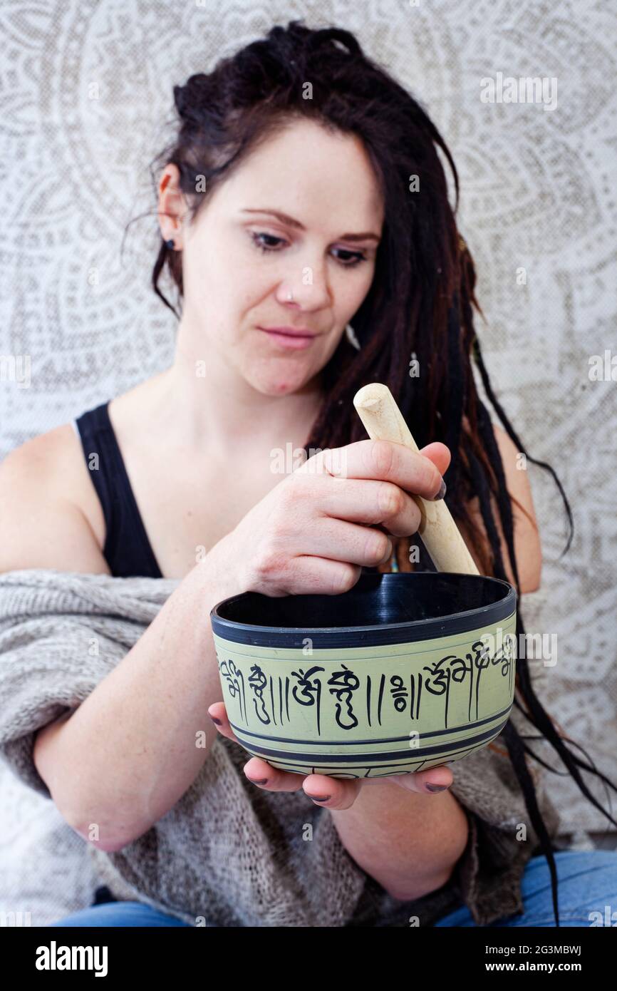 daily meditation practice at home with singing bowl Stock Photo Alamy
