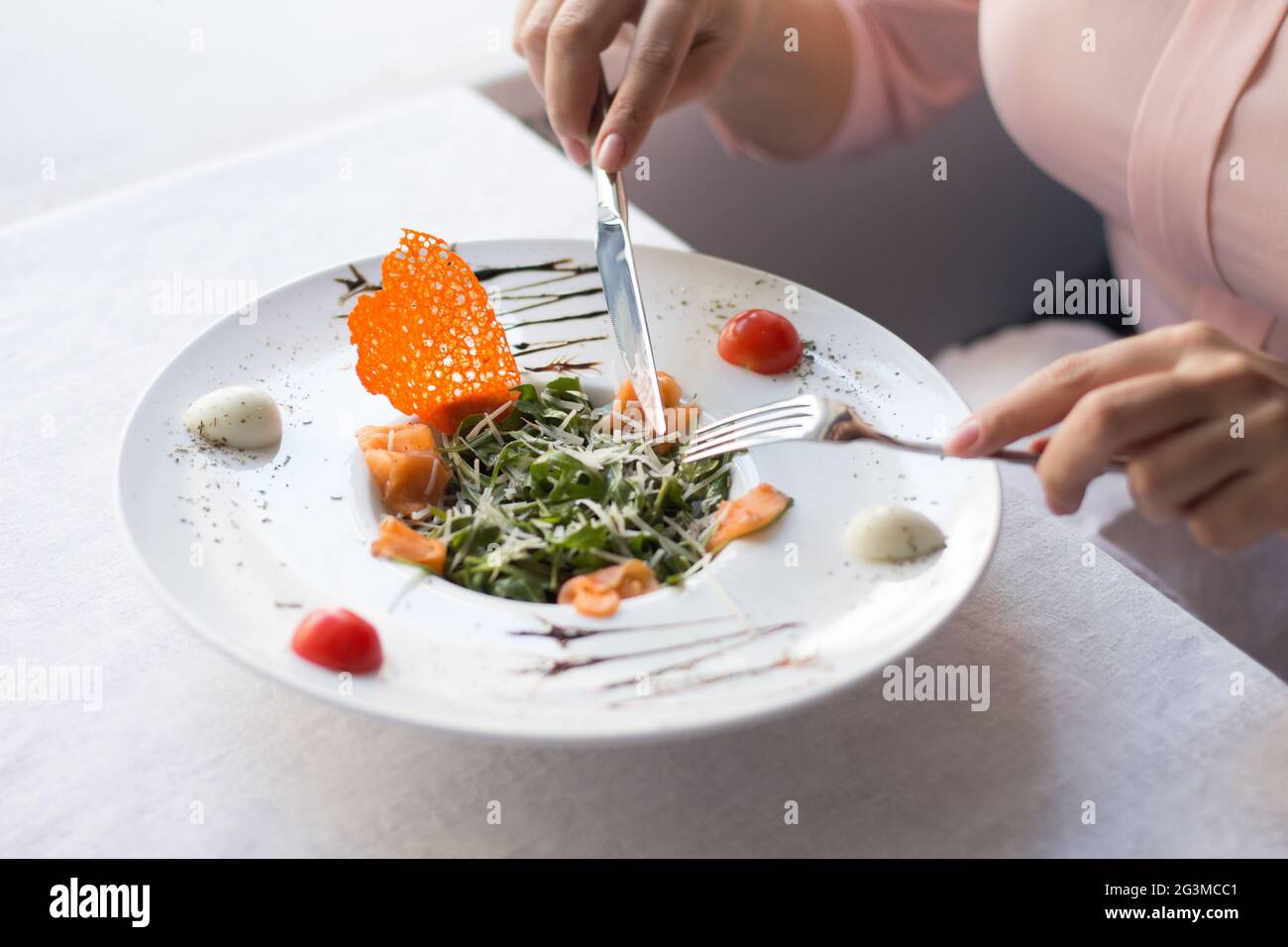 Businesswoman having lunch in luxury restaurant Stock Photo