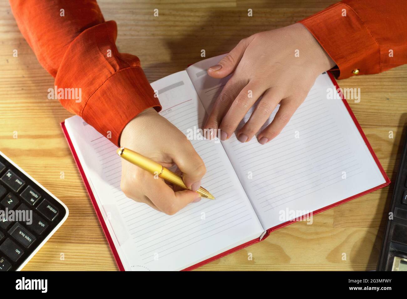 Writing in notebook hi-res stock photography and images - Alamy