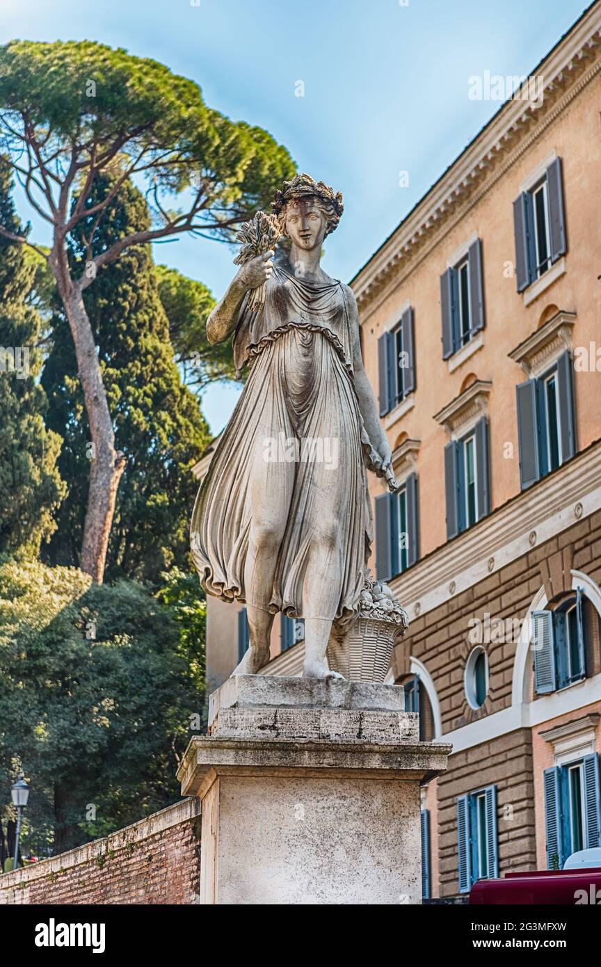 Statue in the iconic Piazza del Popolo, one of the main squares and ...
