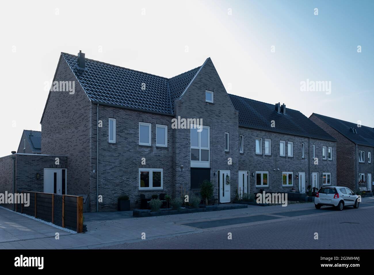 Dutch Suburban area with modern family houses, newly build modern family homes in the Netherlands, dutch family house, apartment house. Netherlands Stock Photo