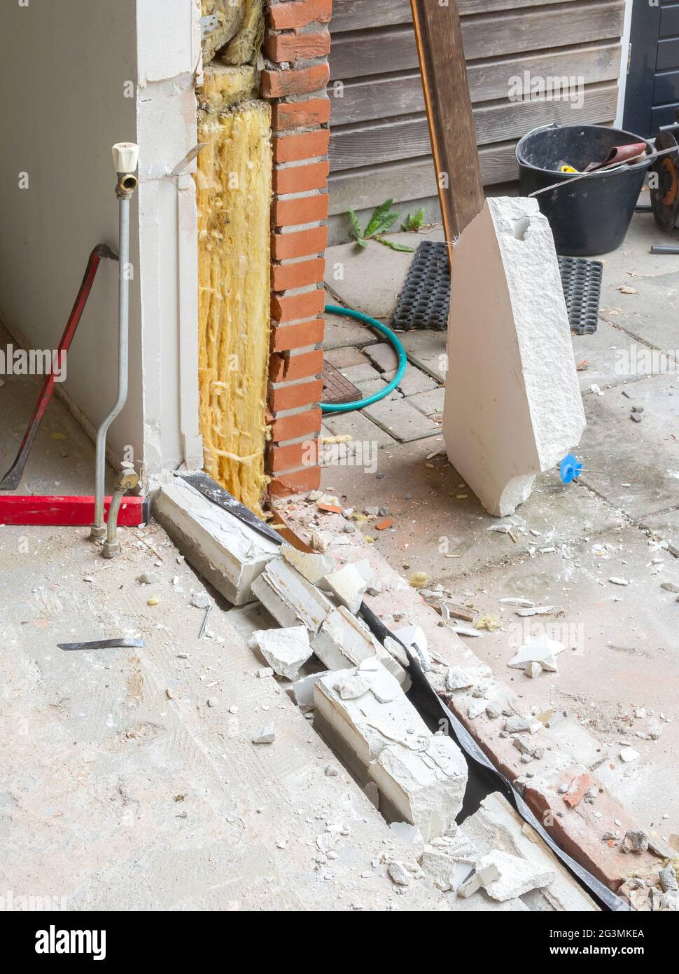 Removing a wall and placing a glass sliding door Stock Photo Alamy