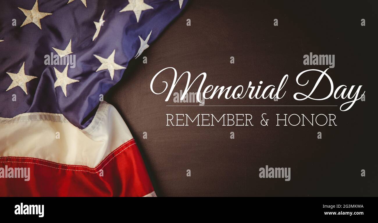 Composition of memorial day text over american flag Stock Photo - Alamy