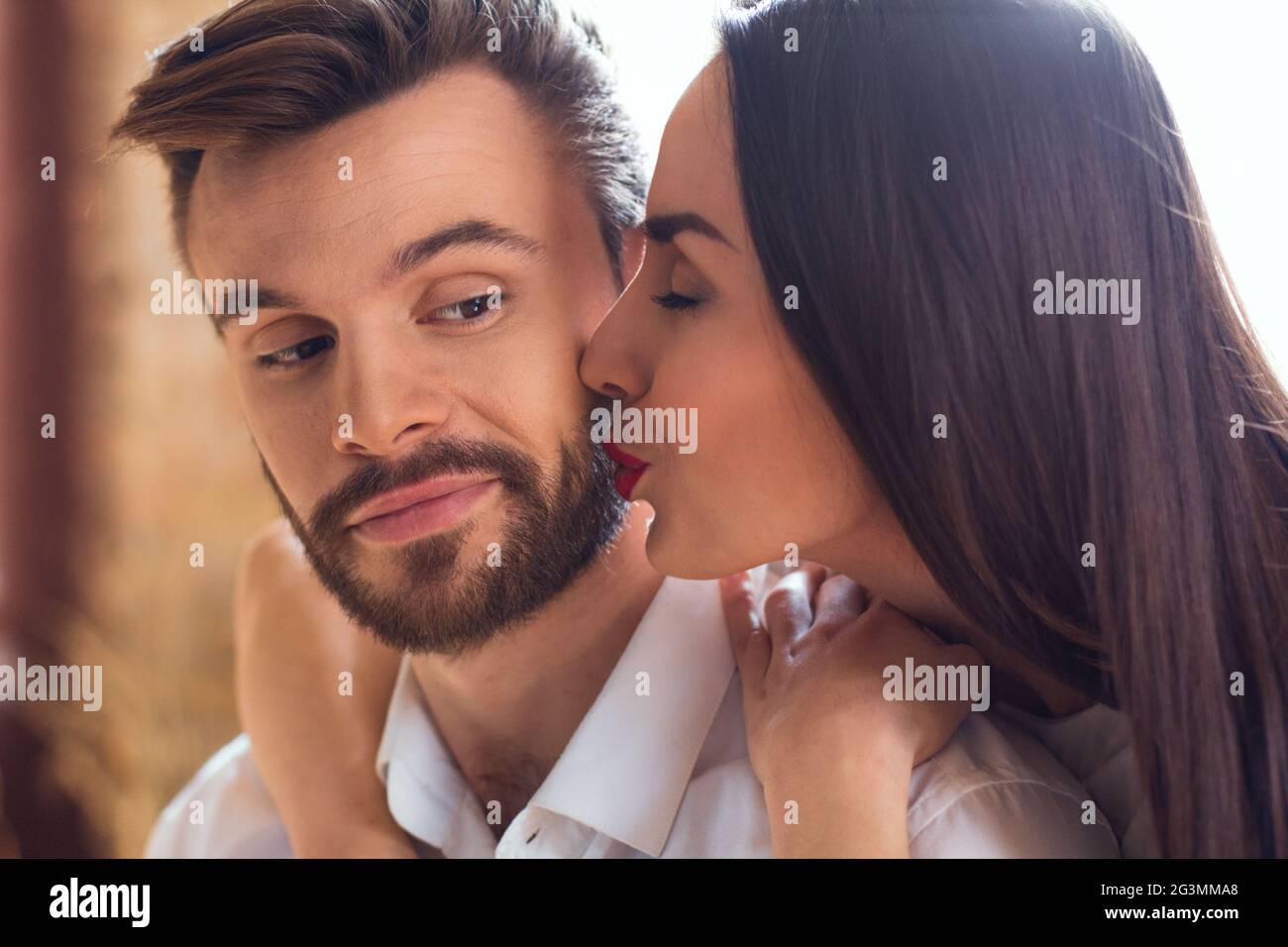 Couple sitting on couch man hi-res stock photography and images - Alamy