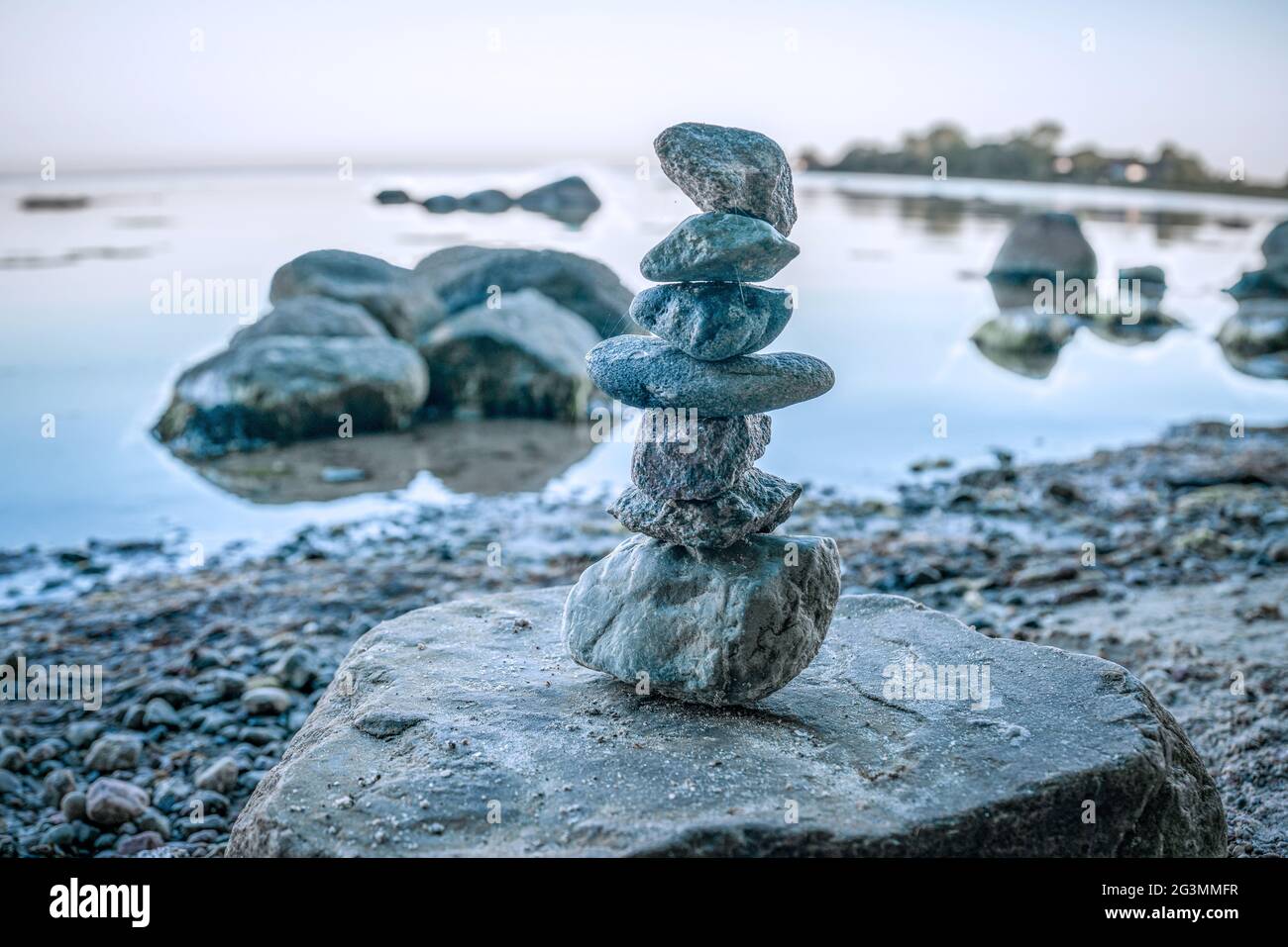 Small cairn of rocks on Wreechen beach on baltic sea island Ruegen Stock Photo