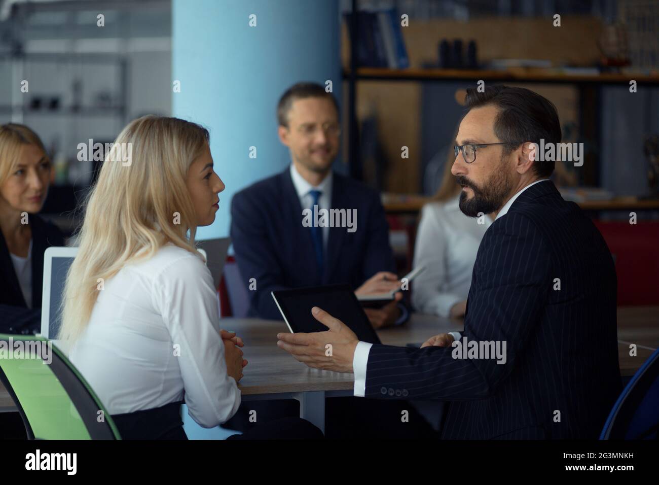 Businessteam working together on project Stock Photo