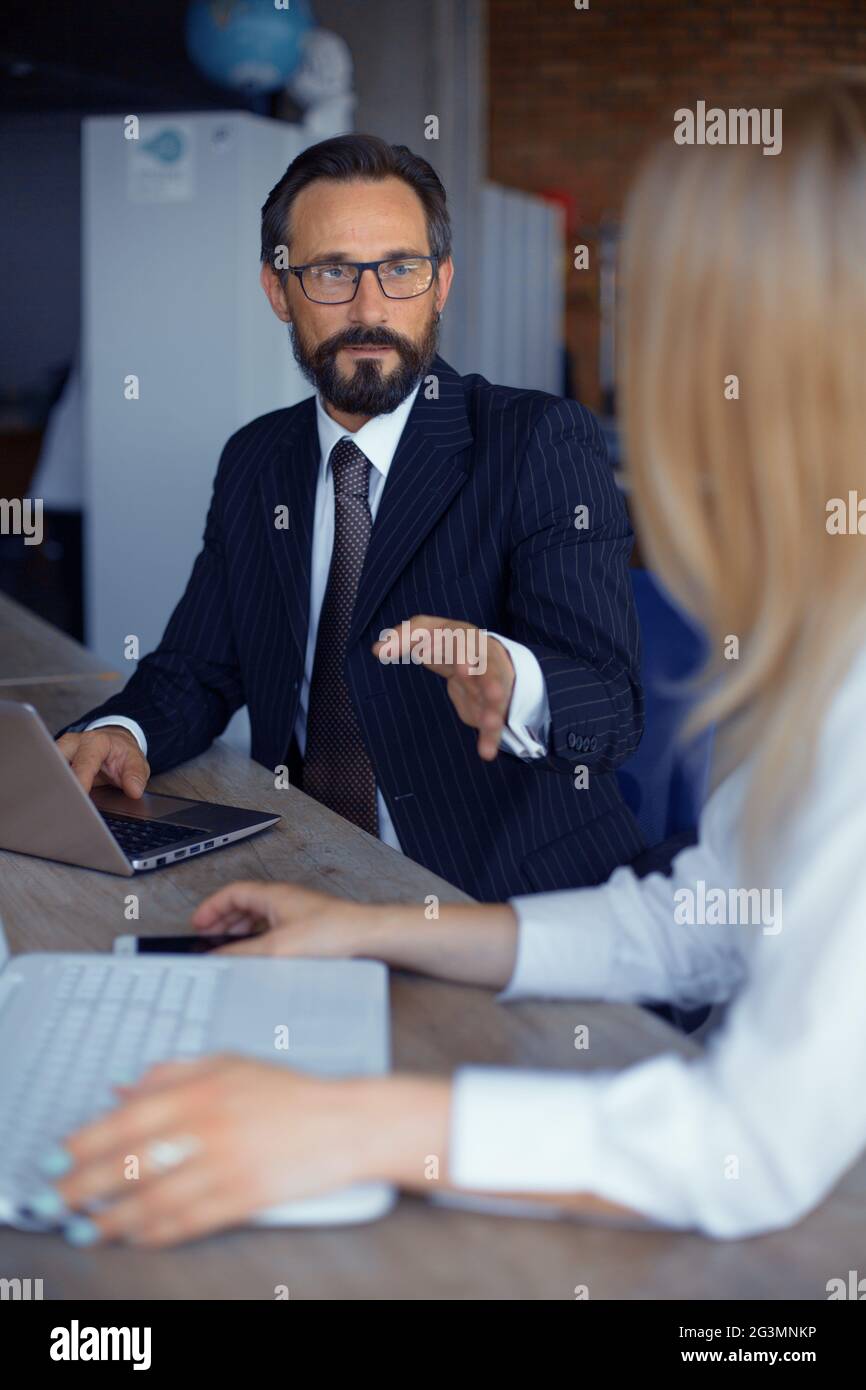 Businessteam working together on project Stock Photo