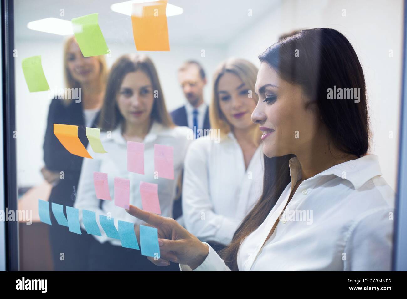 Creative team writing and planning over the project Stock Photo
