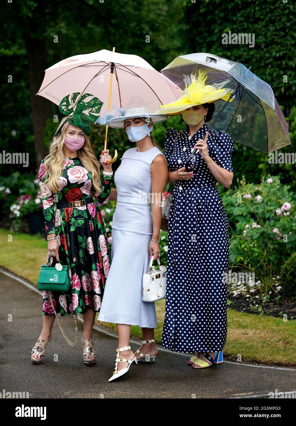 Lesya Warren (left), Kate Ozerov and Maria Zherebtsova arrive ahead of day three of Royal Ascot at Ascot Racecourse. Picture date: Thursday June 17, 2021. Stock Photo