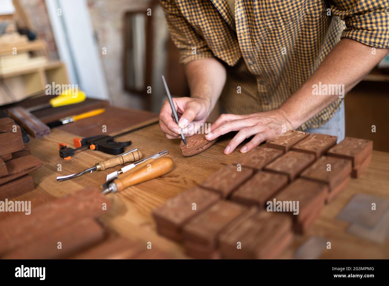 Hands of a joiner Stock Photo