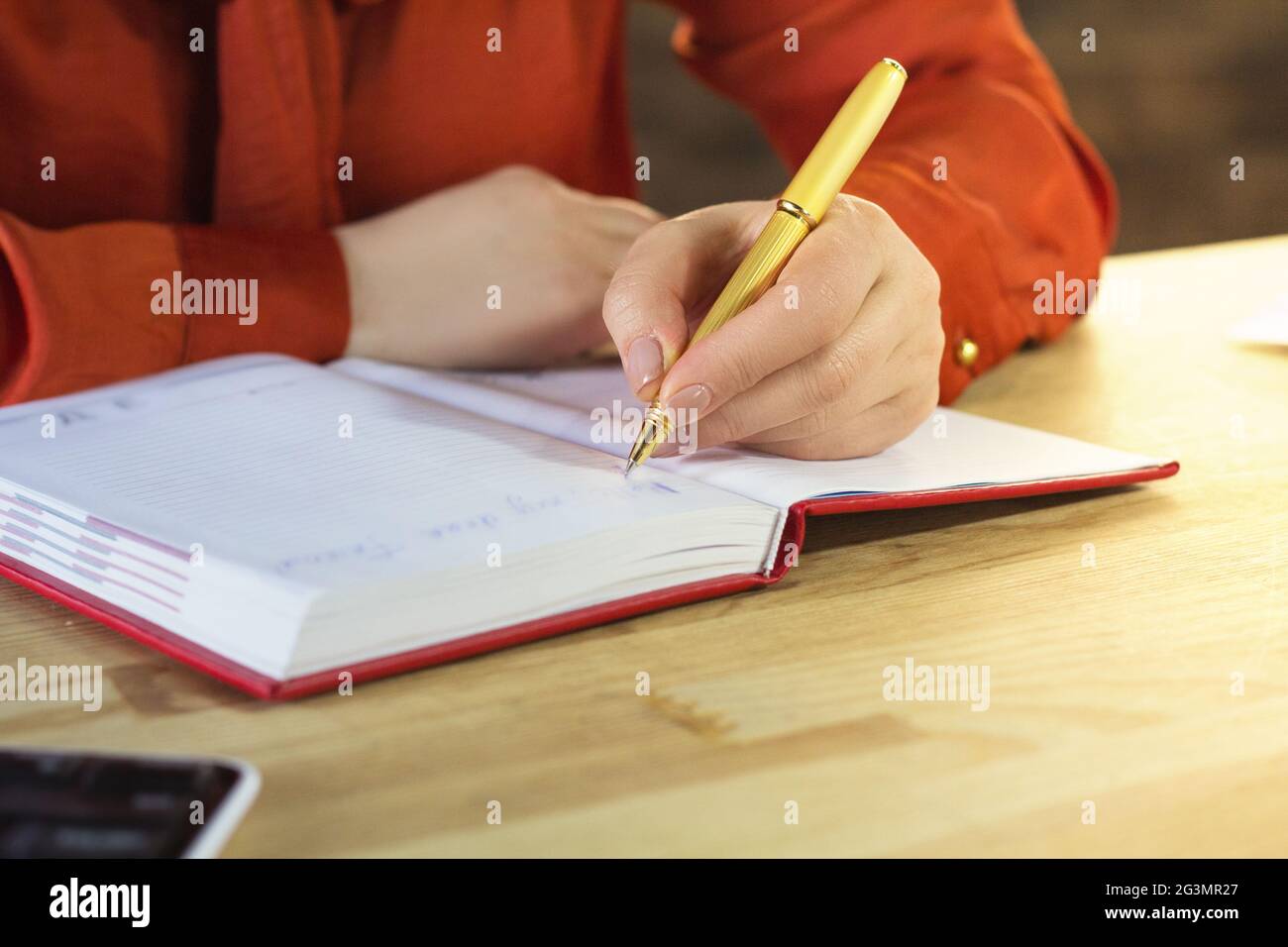 Writing in notebook hi-res stock photography and images - Alamy