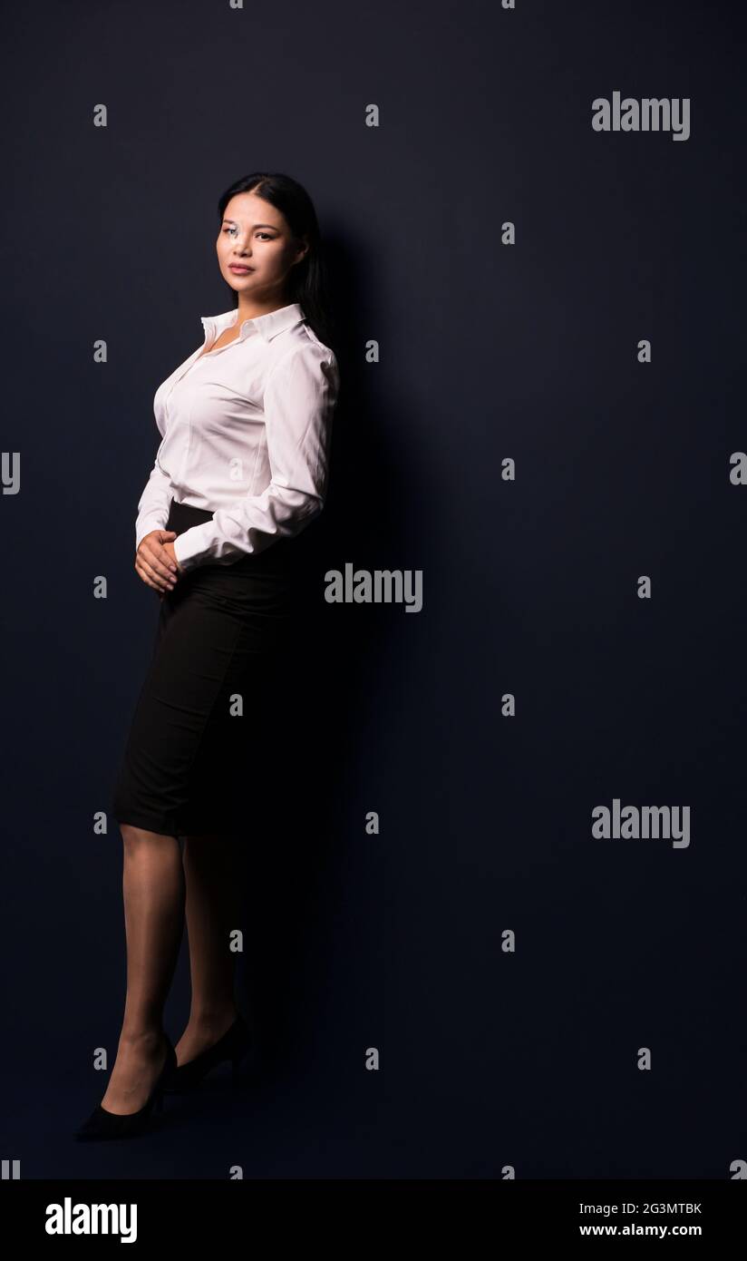 Full length portrait of a young beautiful businesswoman Stock Photo - Alamy