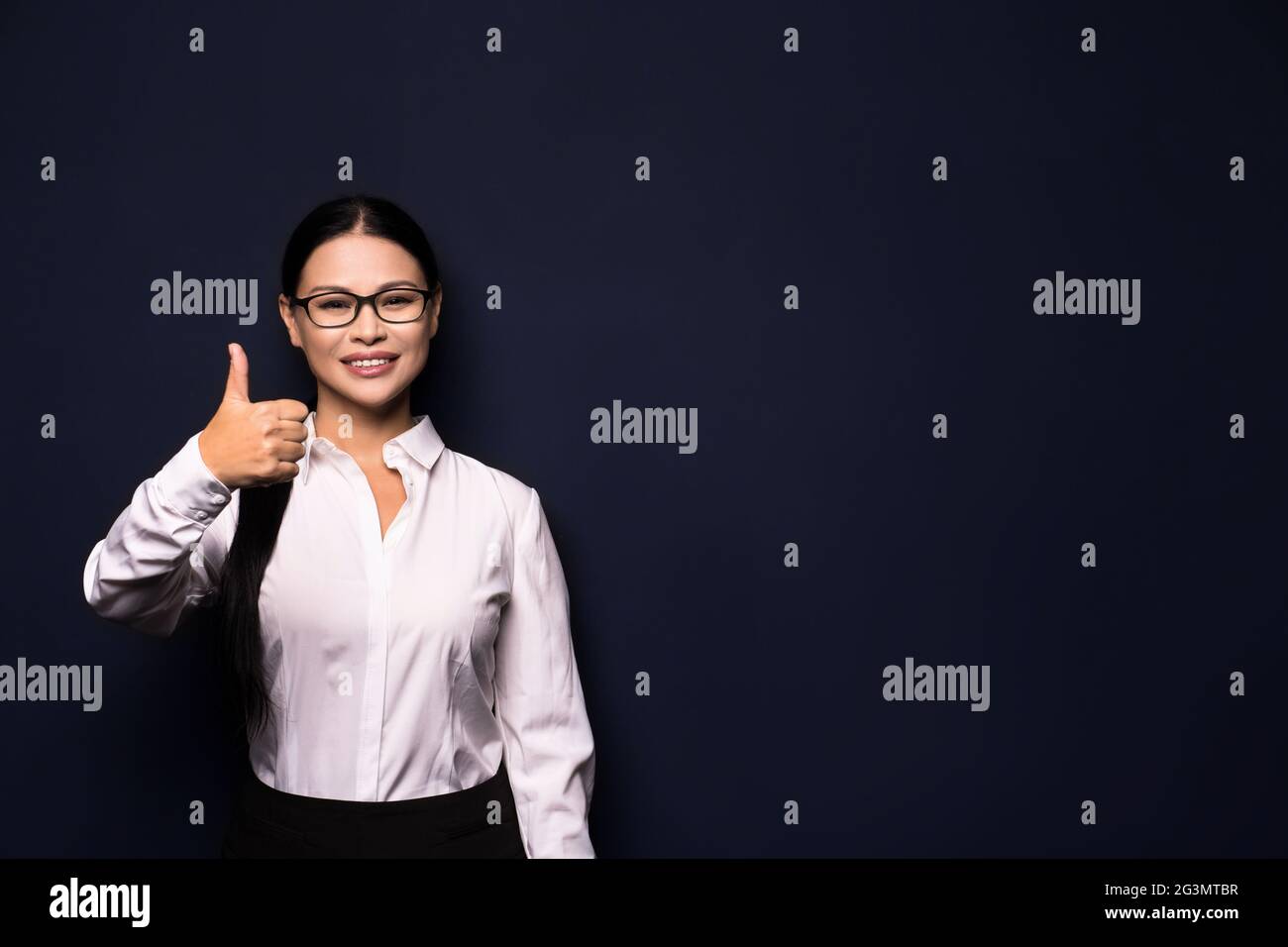 Happy smiling beautiful young business woman Stock Photo - Alamy