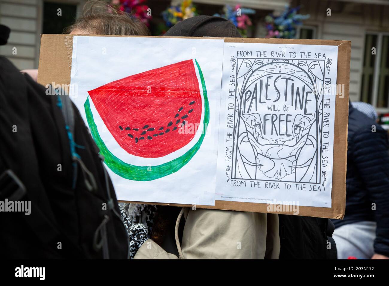 A protester carrying a watermelon sign as a symbol for Palestine at the Free Palestine Protest, London, 22.5.2021 Stock Photo