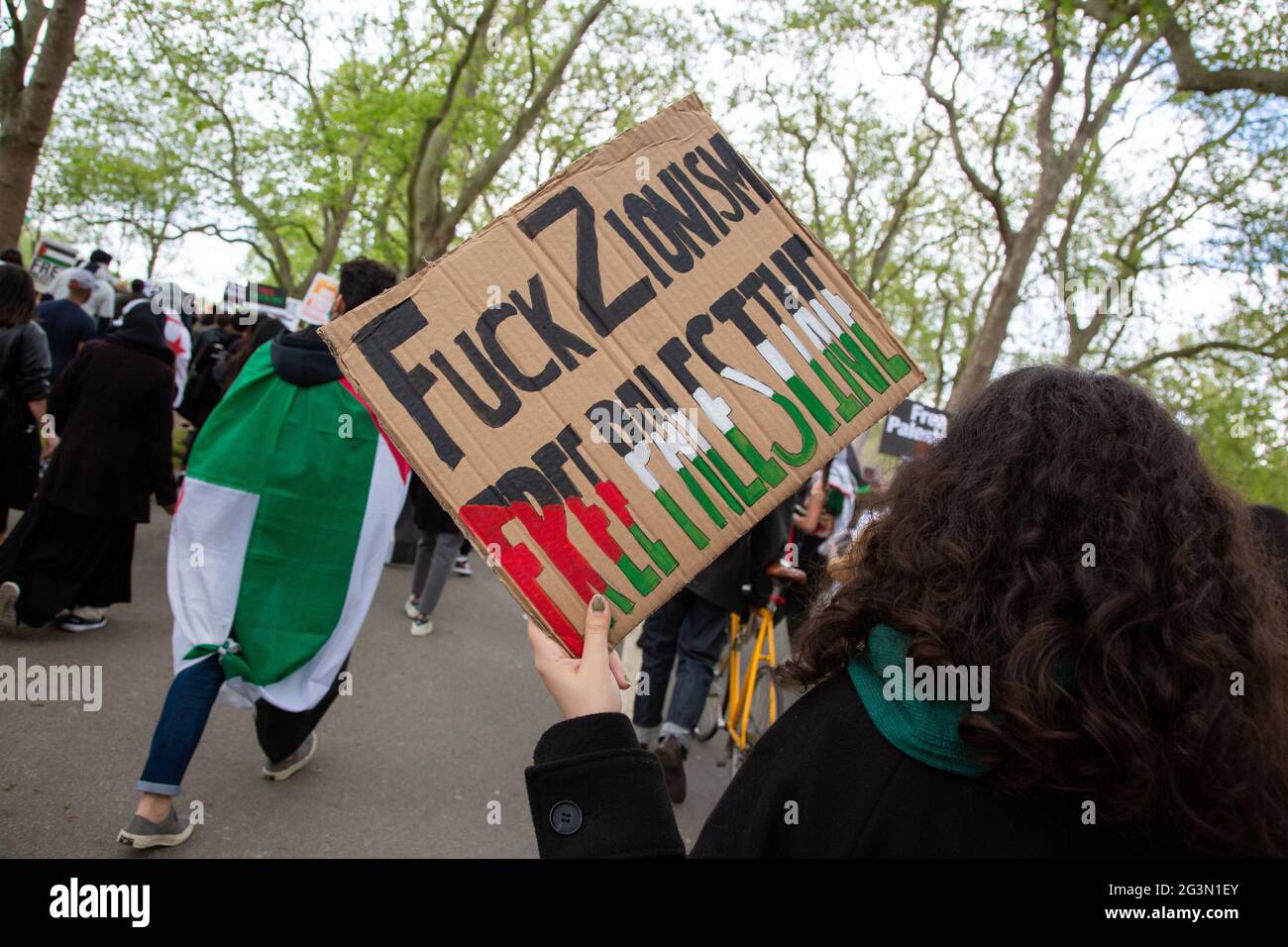 A woman carrying a sign at the Free Palestine Protest, London, 22.5.2021 Stock Photo