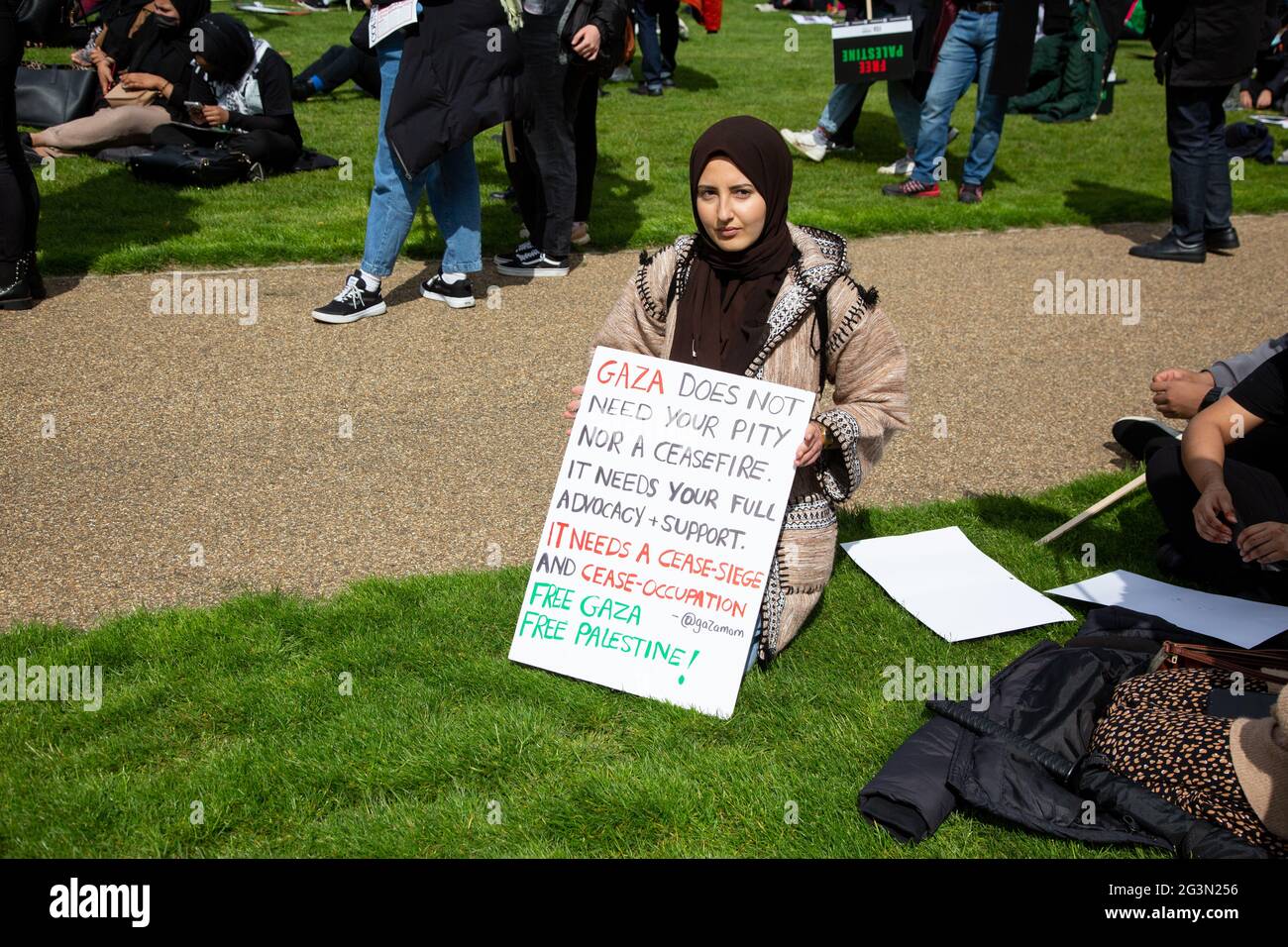 A woman holding a sign at the Free Palestine Protest, London, 22.5.2021 Stock Photo