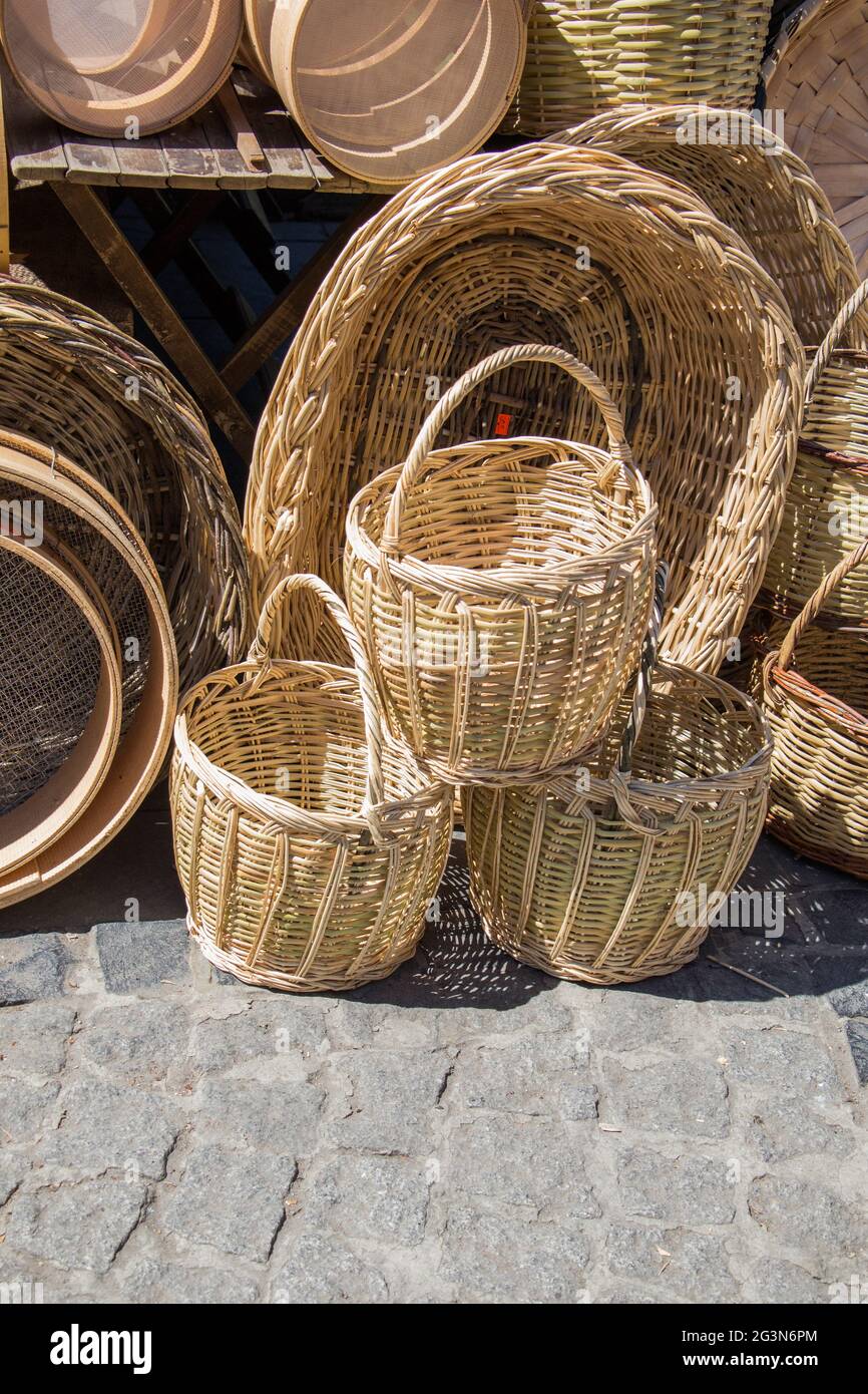 Empty wicker baskets for sale in a market place Stock Photo Alamy