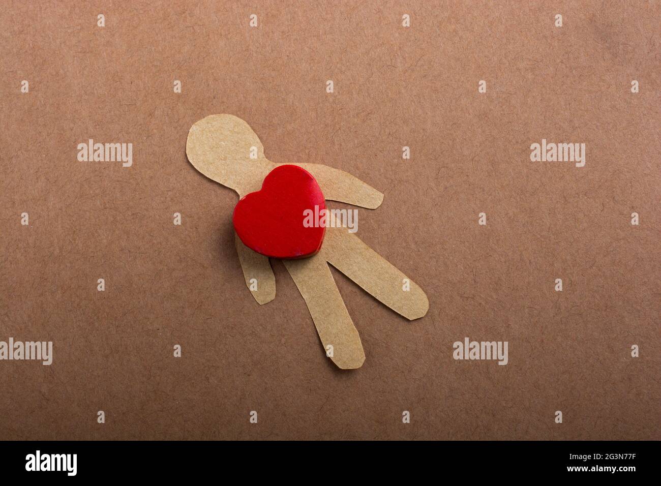 Love concept for with paper hearts and man Stock Photo - Alamy