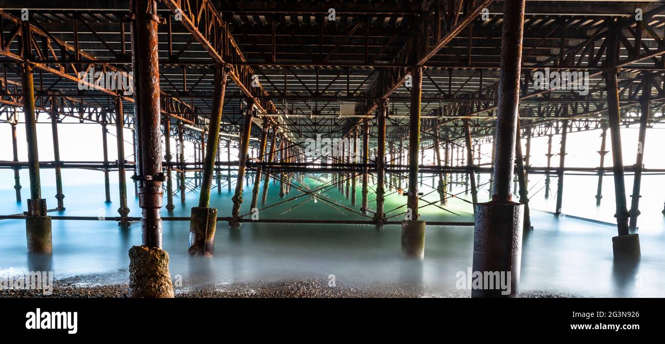 Underneath Hastings Pier on England's south coast. Stock Photo