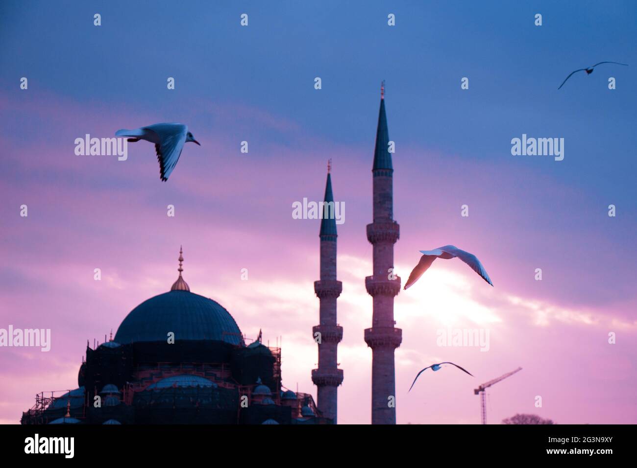 Minaret of Ottoman Mosques in view Stock Photo