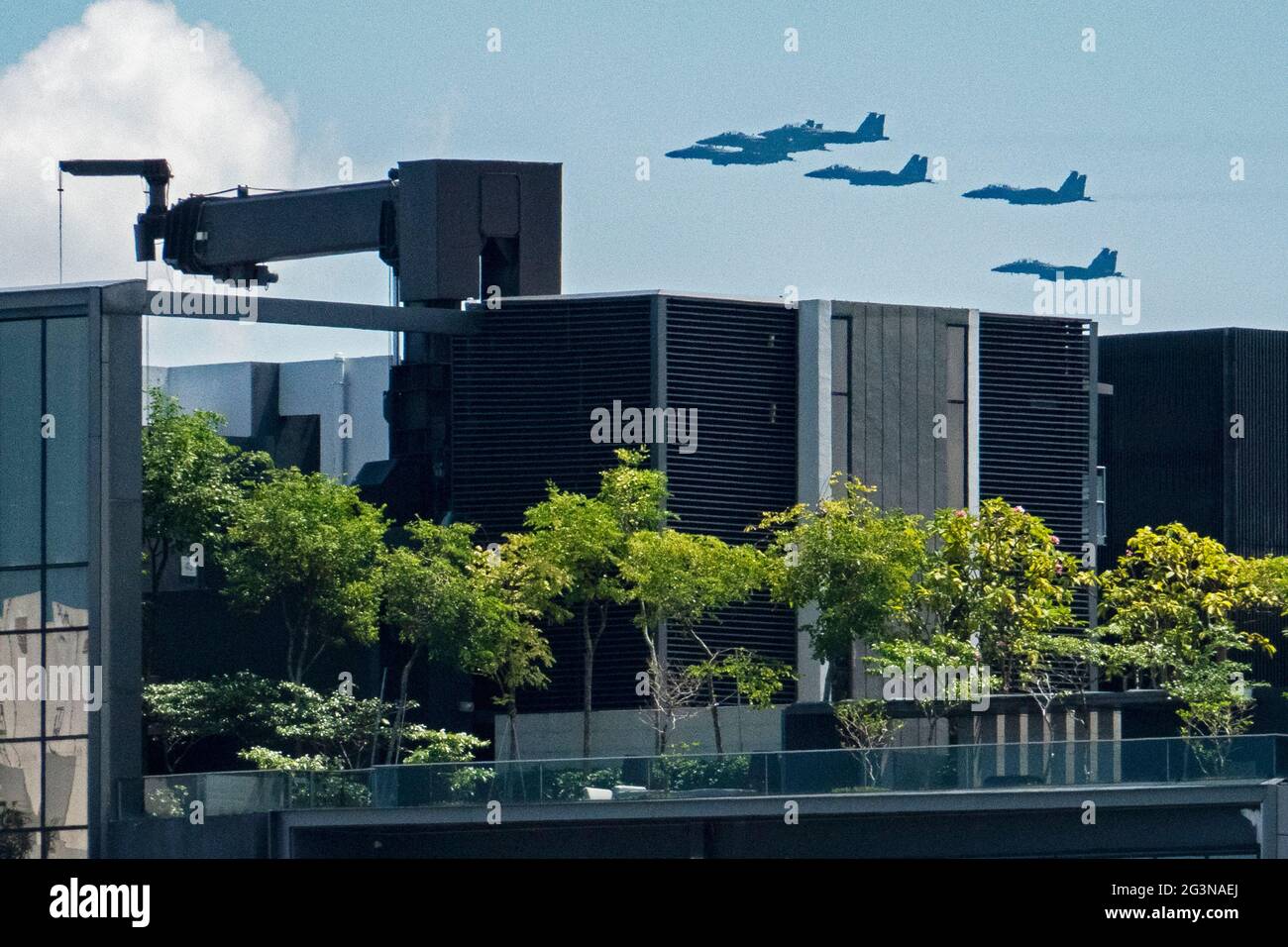 Singapore. 17th June, 2021. Aircrafts fly in formation as part of the rehearsal for the upcoming National Day Parade flying display in Singapore on June 17, 2021. Singapore celebrates its independence day every year on Aug. 9. Credit: Then Chih Wey/Xinhua/Alamy Live News Stock Photo