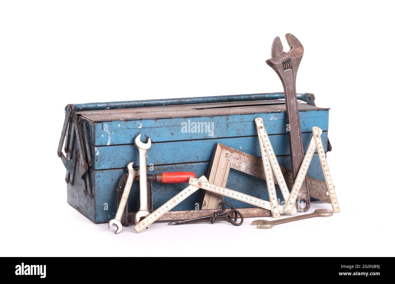 Old toolbox filled with vintage tools Stock Photo