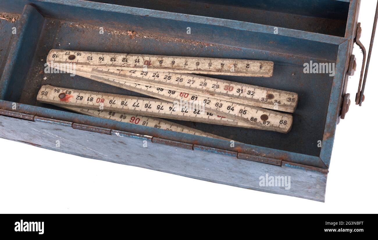 Old toolbox filled with vintage tools Stock Photo