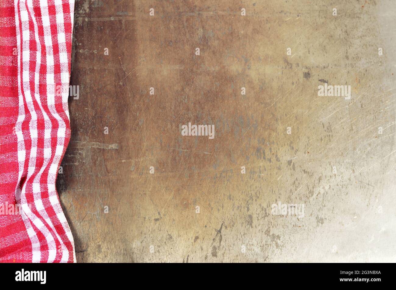 Red checkered tablecloth on grunge background Stock Photo