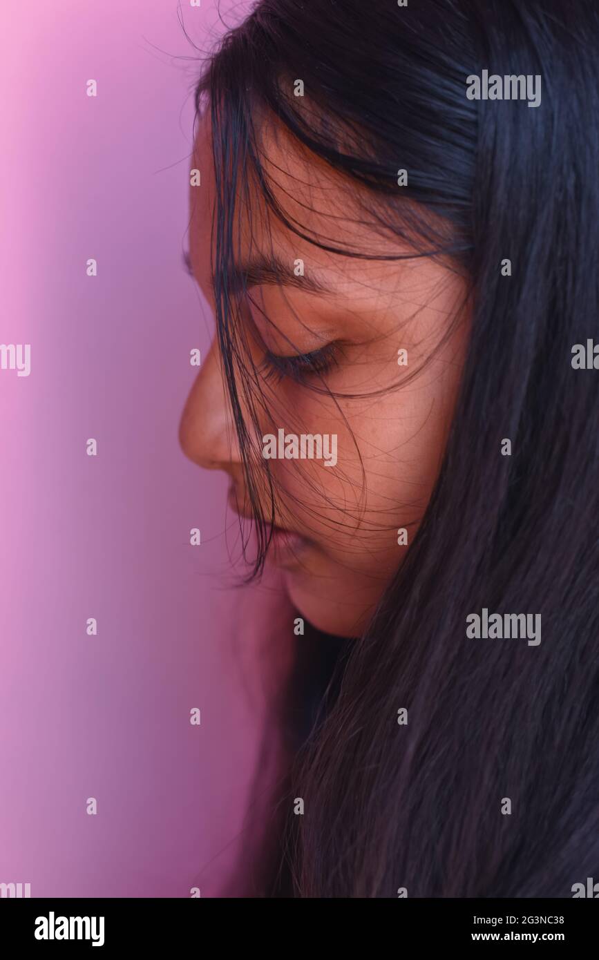 Close up woman face looking down hi-res stock photography and images ...