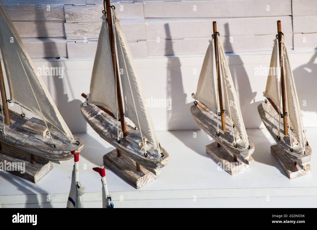 Hand made sail boats in view Stock Photo