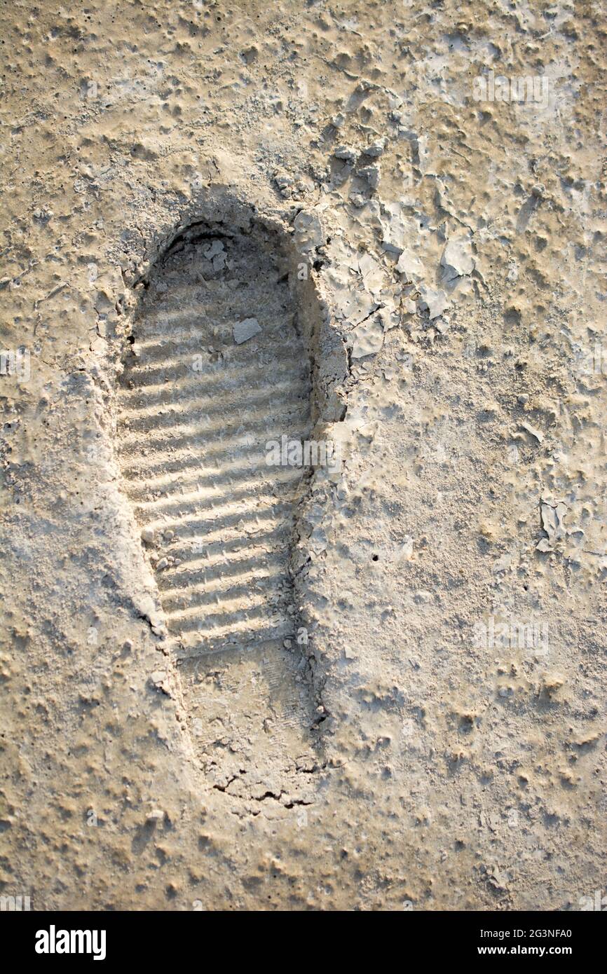 Footstep pattern on a concrete background Stock Photo
