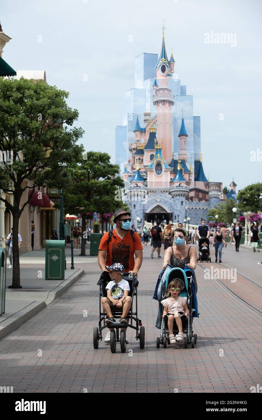 Visitors wear Mickey Mouse ears at Disneyland Paris as the theme park  reopens its doors to the public in Marne-la-Vallee, near Paris, following  the coronavirus disease (COVID-19) outbreak in France on June