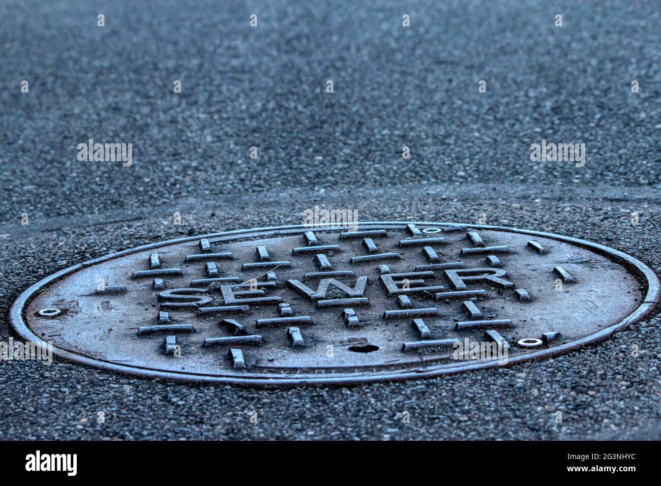 Sewer grate in a neighborhood Stock Photo Alamy