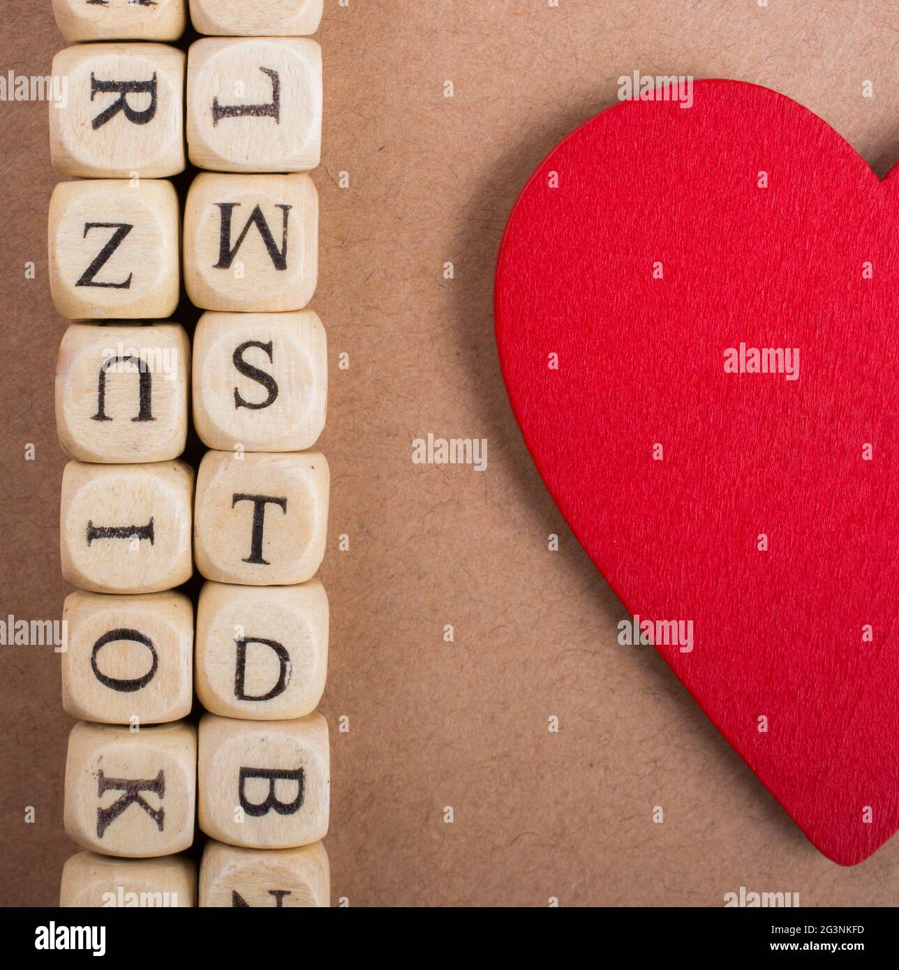 Love icon and Letter cubes of made of wood Stock Photo