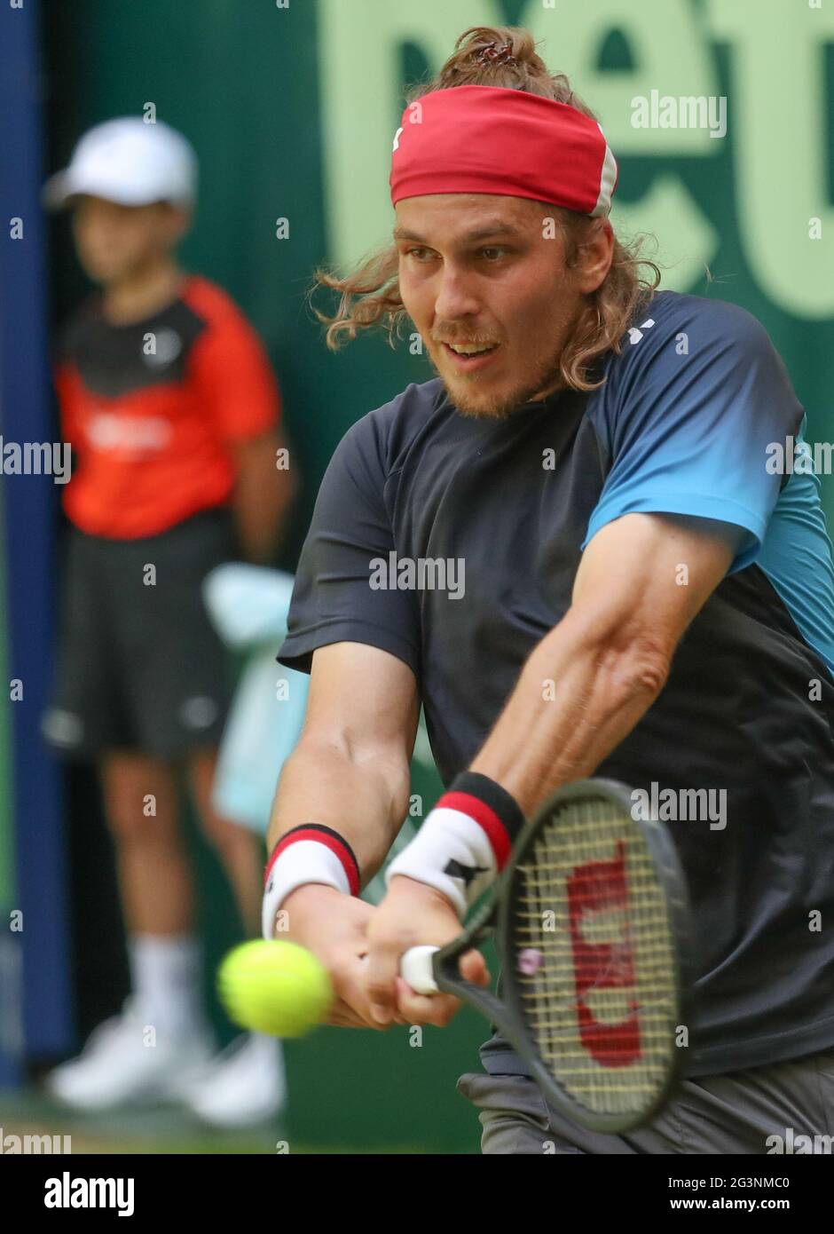 Halle, Germany. 17th June, 2021. Tennis, ATP Tour, Singles, Men, Round of  16, Harris (South Africa) - Lacko (Slovakia): Lukas Lacko plays a backhand.  Credit: Friso Gentsch/dpa/Alamy Live News Stock Photo - Alamy