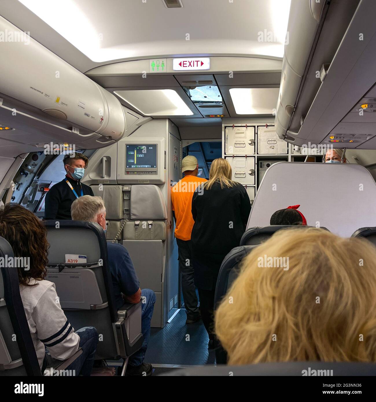 Sanford, FL USA May 13, 2021 People waiting in an Allegiant airplane