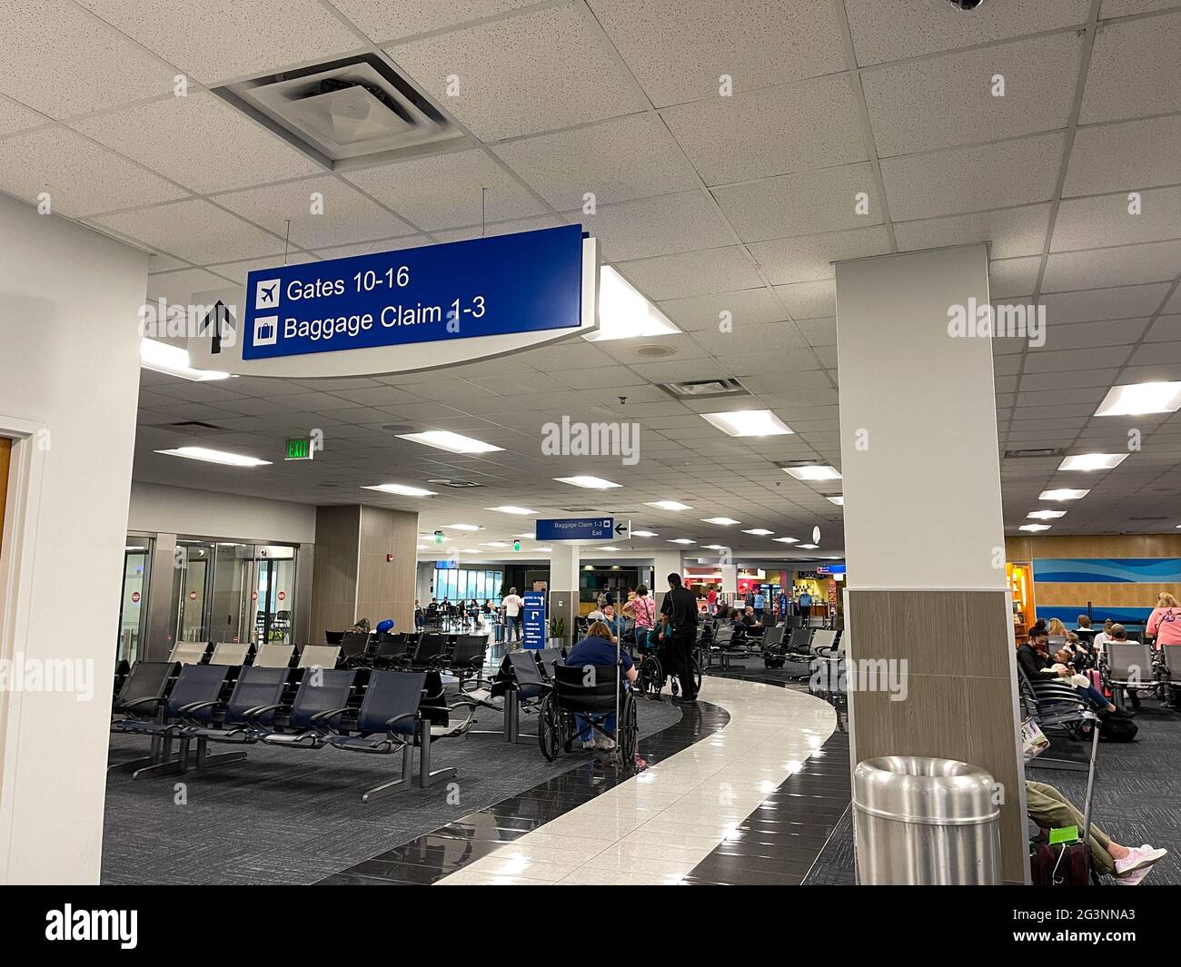 Sanford, FL USA May 13, 2021 People waiting in the gate area to